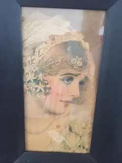 FRAMED “THE BRIDE” A CALENDER C1927. FOR POMPEIAN RODUCTS.