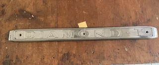 1950’s DIAMOND T SEMI TRUCK DOOR EMBLEM