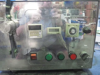 Alpha - Pack semi-automatic liquid filling machine  9822S