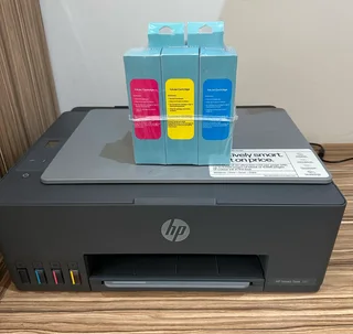 Hp Smart Tank 581 all in one printer and extra ink refill