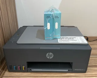 Hp Smart Tank 581 all in one printer and extra ink refill