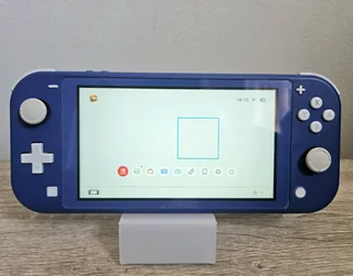 Nintendo Switch Lite | Plus charger | Priced to go
