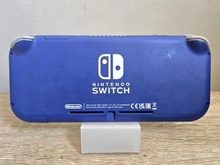 Nintendo Switch Lite | Plus charger | Priced to go