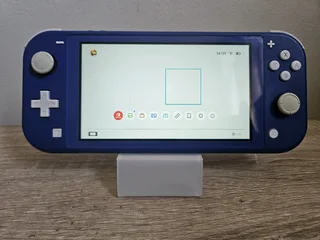 Nintendo Switch Lite | Plus charger | Priced to go