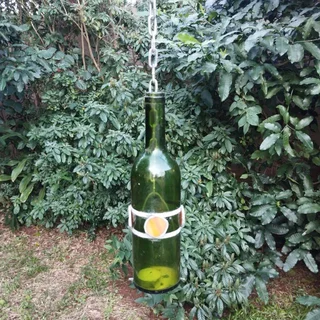 Hanging decorative bottle tea light candle holder