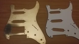 Fender pickguard Brass