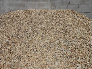 Stone and Bark have tons of 19mm Worcester stone available, ready for delivery. Call 021-5552782