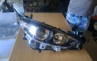 Mazda 3 right front headlamp
