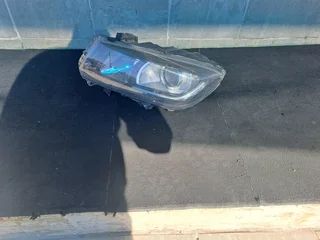 Suzuki vitara brezza left front headlamp