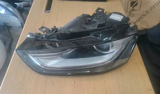 Audi a4 left headlamp