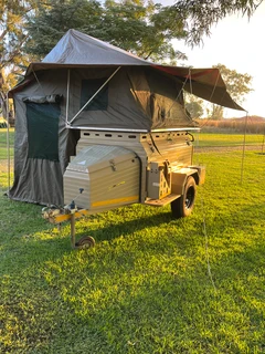 Wilderness 310 trailer with rooftop tent - used once and tyres still new