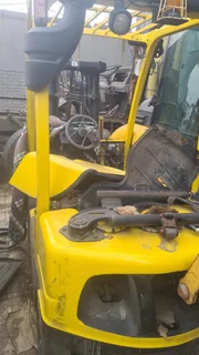 TLB. Tractor-Loader-Backhoe.