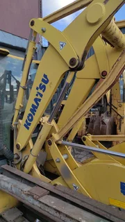 TLB. Tractor-Loader-Backhoe.