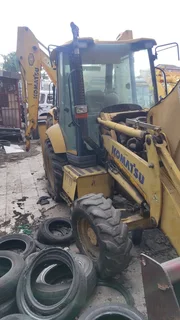 TLB. Tractor-Loader-Backhoe.