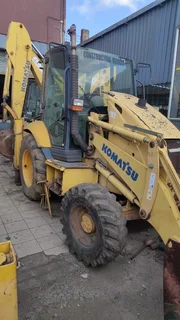 TLB. Tractor-Loader-Backhoe.