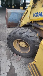 TLB. Tractor-Loader-Backhoe.