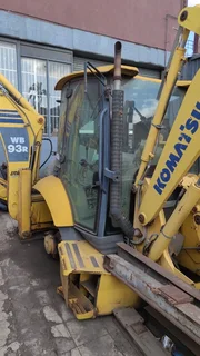 TLB. Tractor-Loader-Backhoe.
