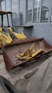 TLB. Tractor-Loader-Backhoe.