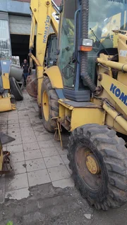 TLB. Tractor-Loader-Backhoe.