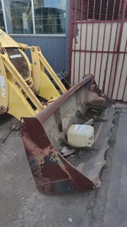 TLB. Tractor-Loader-Backhoe.