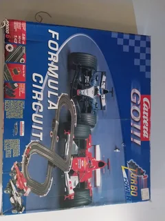 Remote controlled toy cars on tracks