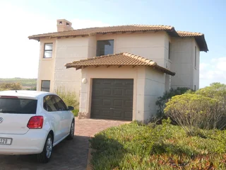 Rent or buy a  beautiful 3 bedroom double storey house on langebaan country estate.