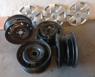 4 X Nissan NP200 steel rims (4 stud) 15 inch plus 3 x Nissan NP200 Hub Cabs - 2021 model.