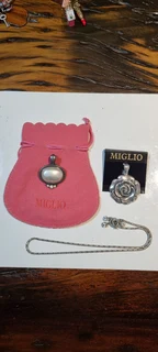 2 X MIGLIO PENDANTS AND CHAIN