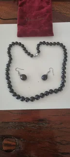 String 0f Black Pearls With Earrings