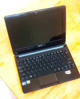 Computer Aspire One Notebook, Requires upgrading to MS Word 10 or 11.