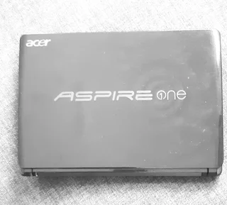 Computer Aspire One Notebook, Requires upgrading to MS Word 10 or 11.