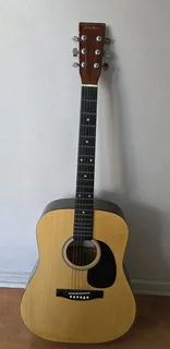 Pearl River model 014 acoustic guitar