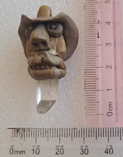 Quartz set in clay pendant R50. Collect in Tulbagh or Pudo locker fee is R50.