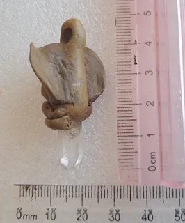 Quartz set in clay pendant R50. Collect in Tulbagh or Pudo locker fee is R50.