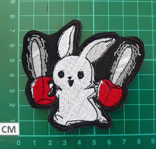 Embroidered chain saw bunny fabric patch
