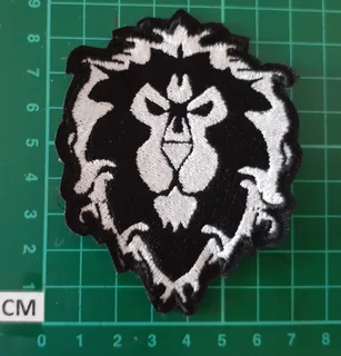 Embroidered lion head fabric patch
