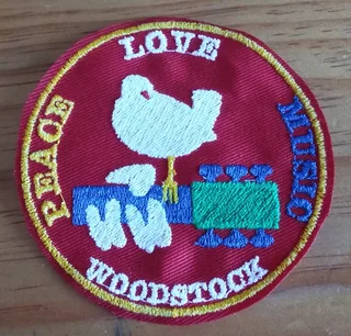 Embroidered woodstock fabric patch