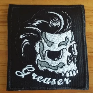 Embroidered greaser fabric patch
