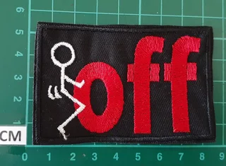 Embroidered off fabric patch