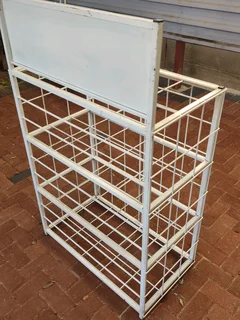 Battery storefront display cage