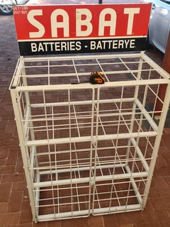 Battery storefront display cage
