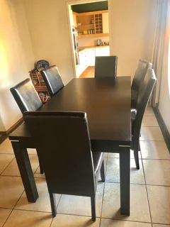 6 Seater Dining Table - dark brown wood