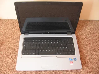 HP i7 8GB Gaming Laptop with NEW battery, looks like MacBook