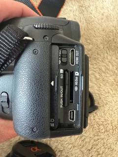 Combo of a Sony A 390 Digical Camera with 18-55 Lens and 75 -300 lens battery charger etc