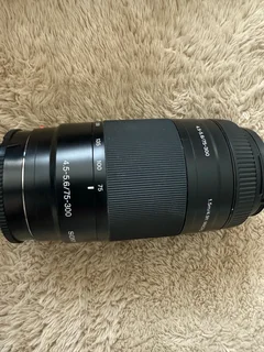 Combo of a Sony A 390 Digical Camera with 18-55 Lens and 75 -300 lens battery charger etc