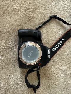 Combo of a Sony A 390 Digical Camera with 18-55 Lens and 75 -300 lens battery charger etc