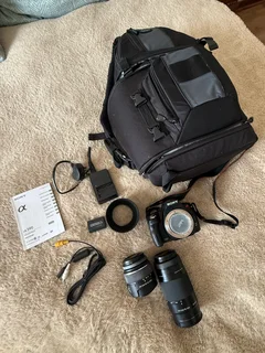 Combo of a Sony A 390 Digical Camera with 18-55 Lens and 75 -300 lens battery charger etc