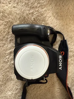 Combo of a Sony A 390 Digical Camera with 18-55 Lens and 75 -300 lens battery charger etc