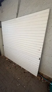White wooden single garage door