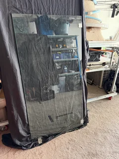 Bathroom shower glass panels